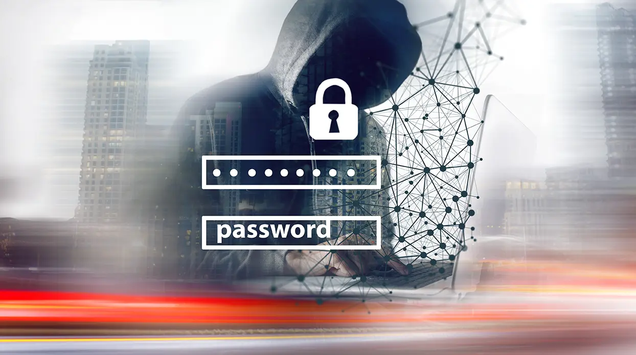 Persona con capucha poniendo password, Medidas esenciales para mantener tus contraseñas seguras