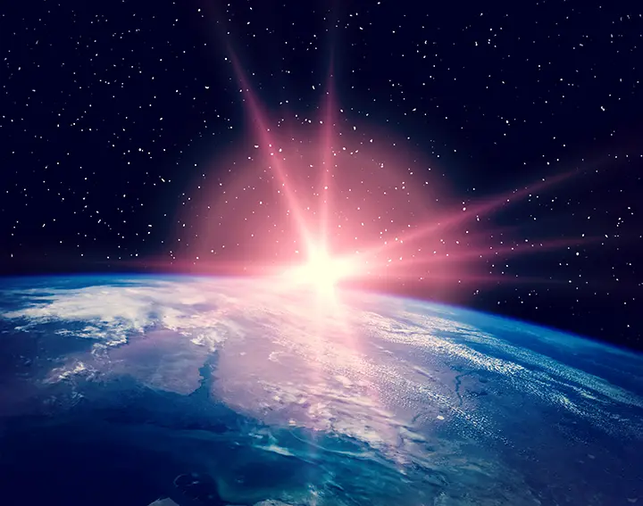 Foto del la tierra y el sol desde el espacio, representando una nueva startup que quiere abrir un hotel de lujo en el espacio.